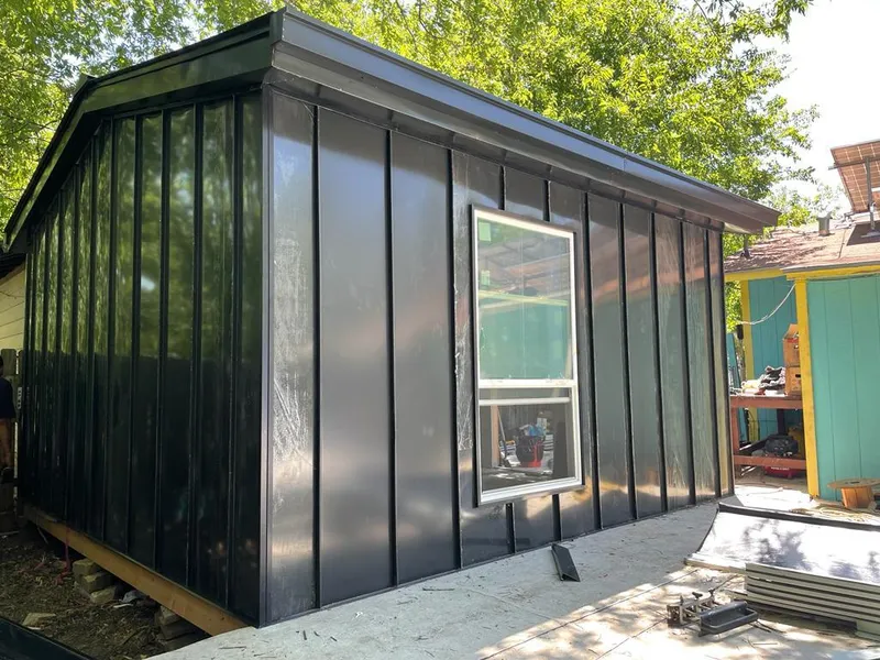 Black standing seam metal wall panels for Metal Roof Installation in Galliano