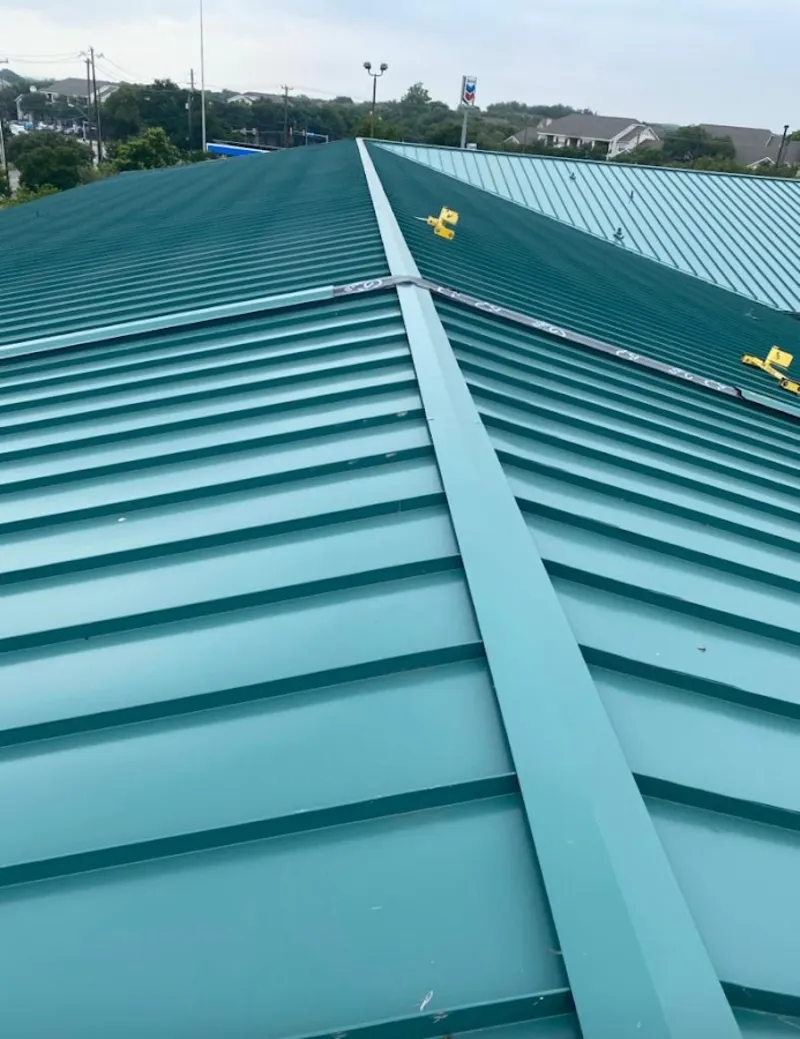 Green commercial metal roof ridge and valley for Metal Roof Repair in Galliano